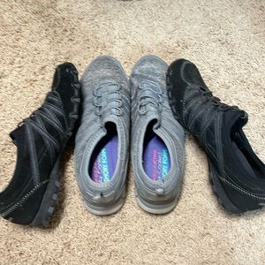 Two pairs of Skechers slip-on shoes.. memory foam air cooled